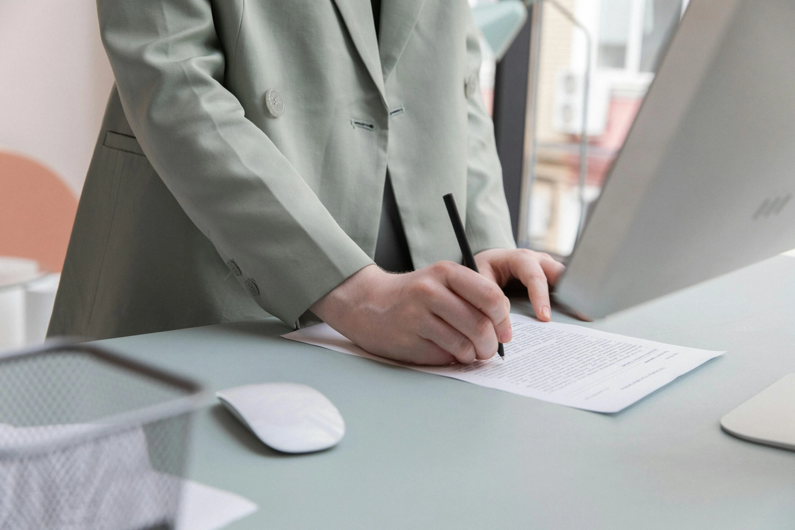 Person preparing documents to ensure regulatory compliance for a family office