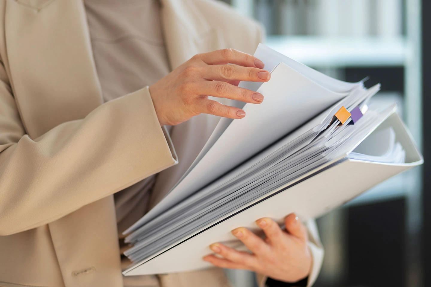 Lady compiling documents for international school admission in Singapore.