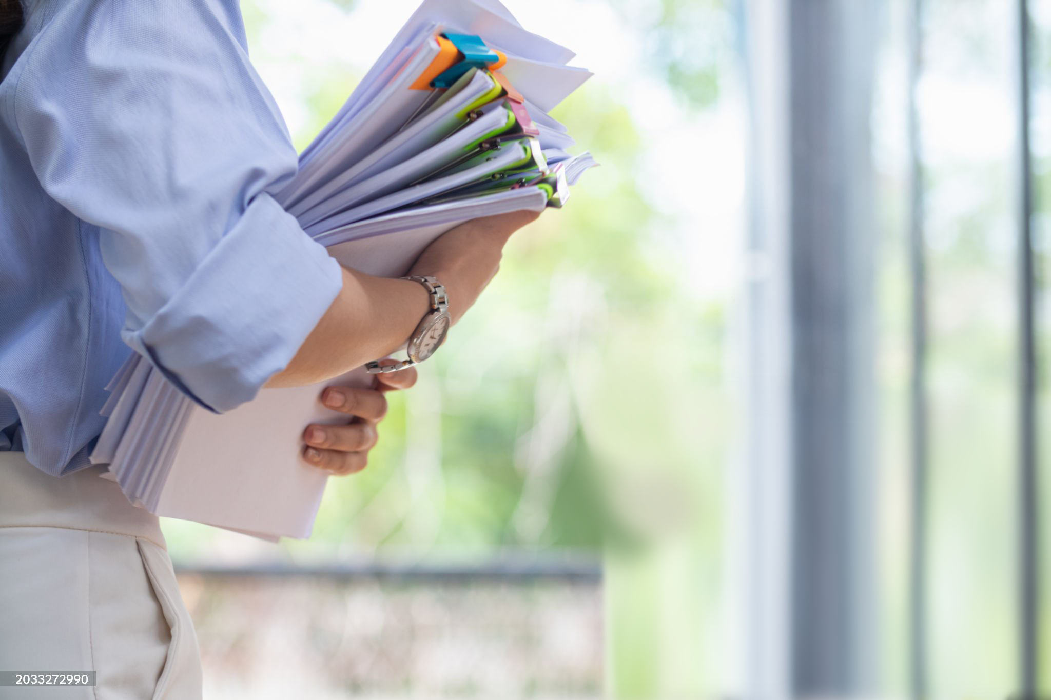 Corporate secretary preparing legal documents and regulatory filings for a company