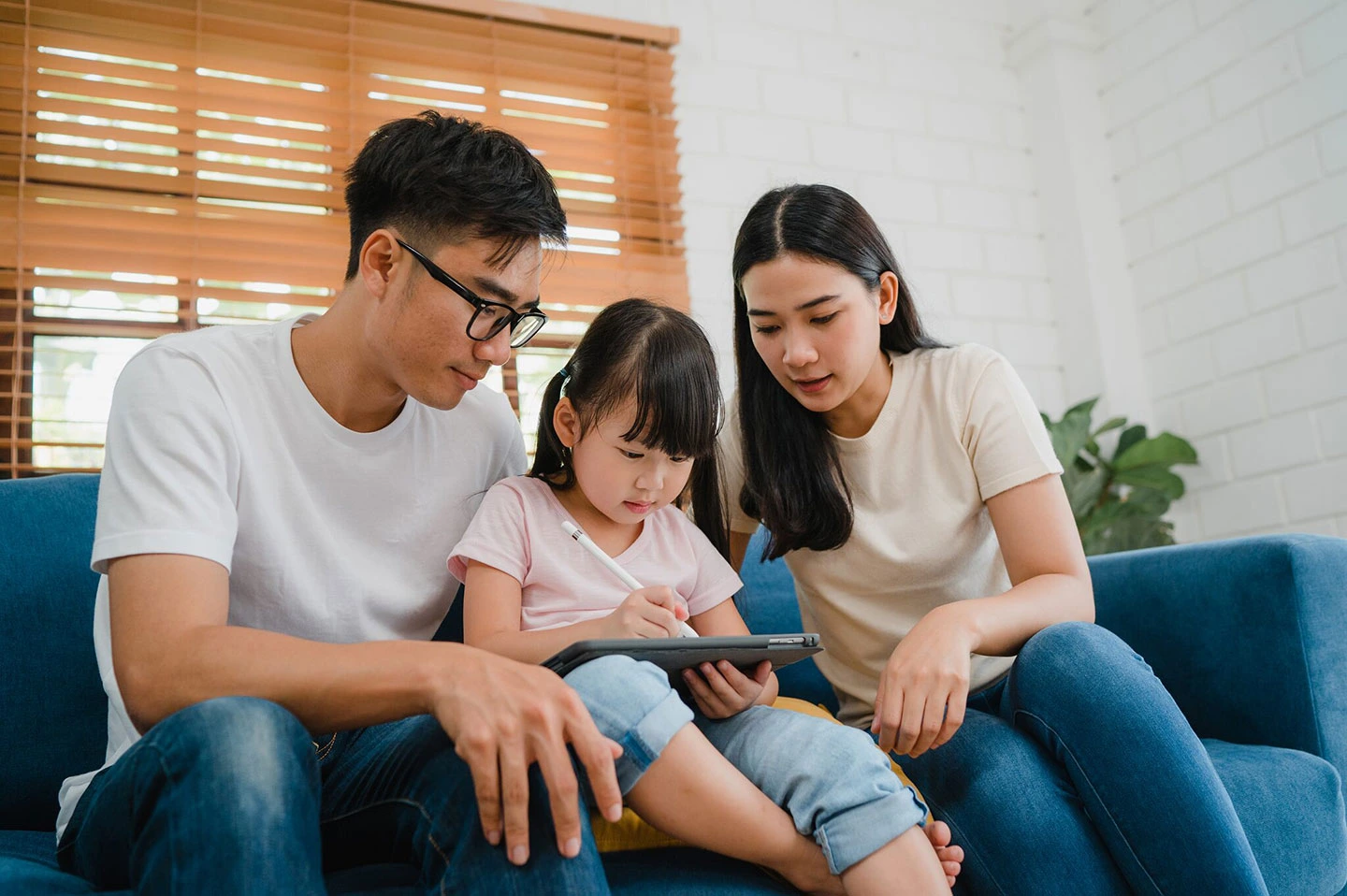 Family with children happily relocating to Singapore on a Dependent Pass.